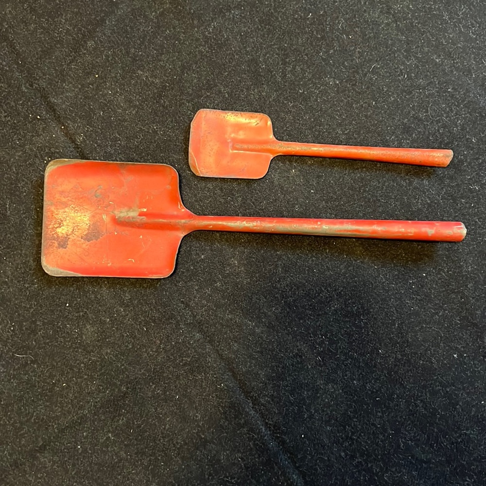 Antique metal toy shovels